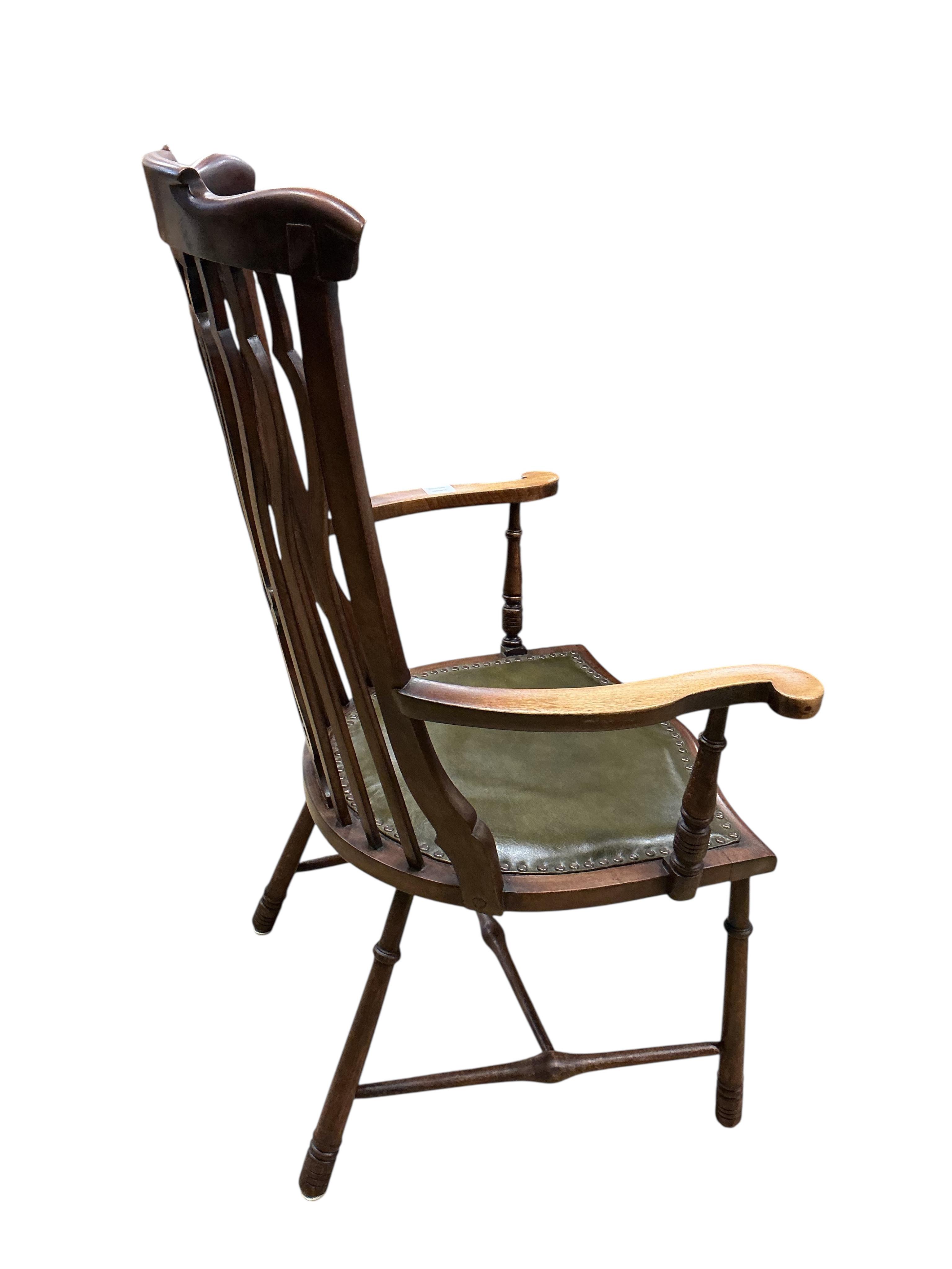 An early 20th century beech and mahogany Windsor armchair, width 67cm, depth 50cm, height 105cm